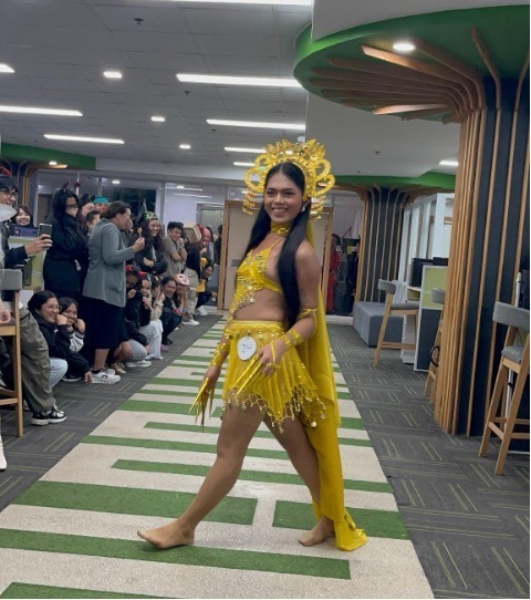 Third Place Fantasy winner in a gold character costume