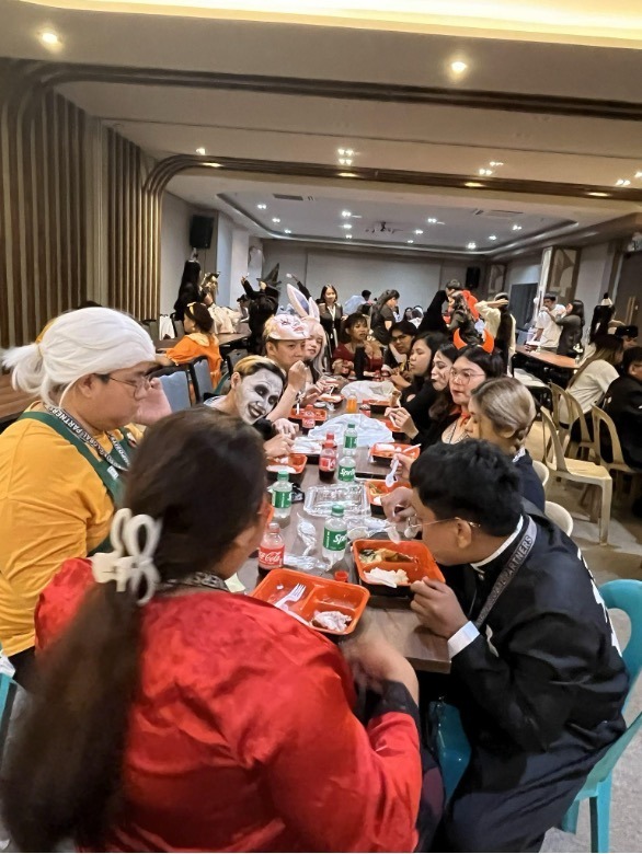 Composite team enjoying lunch after Spookfest 2025